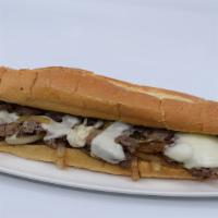 The Classic Philly Cheesesteak Sandwich · Chopped sirloin with melted provolone cheese or the traditional Cheese Wiz, grilled onions, ...
