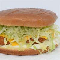 The Point Loma Fish Sandwich · Golden Fried Fish Patty with American Cheese, Shredded Lettuce and Tartar Sauce! 

Served wi...