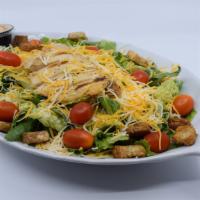 Spicy Chipotle Chicken Salad · Crisp Cold Romaine Lettuce, Grilled Chicken, Tomato, Shredded Jack and Cheddar Cheese, Crunc...