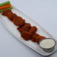 Boneless Buffalo Wings · Large wings marinated overnight in a rub, slow cooked, and tossed in. Crisp celery, carrot s...