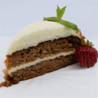 Carrot Cake · Delicious moist layers of carrot cake with thick and creamy cream cheese frosting.