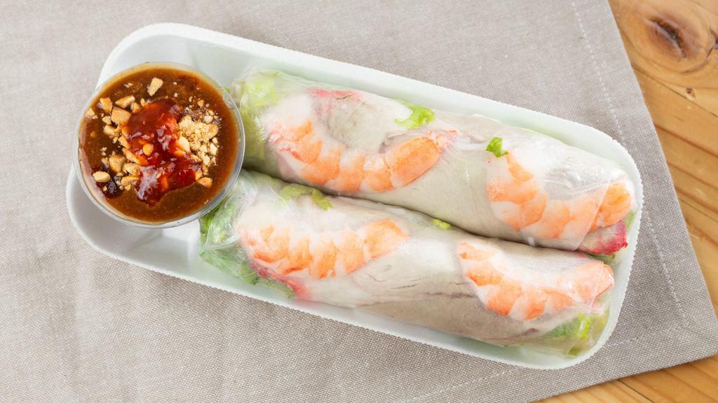 Spring Rolls · 2 rolls per order. Rice Paper, Grean Leaf Lettuce, Mint, Bean Sprouts, Vermicelli Noodles, Chives, House Peanut Sauce, Peanuts & Chili.