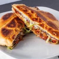 Torta · Toasted bread with melted cheese, choice of meat, onion, cilantro, hot or mild sauce. Served...
