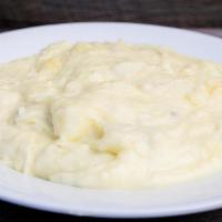 Garlic Mashed Potatoes (Gf) (V) · Yukon Gold potatoes mashed with butter, cream, and roasted garlic. Gluten-Free & Vegetarian.