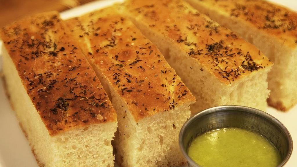 Focaccia Bread & Scallion Sauce (Ve) · Housemade focaccia bread baked daily and served with our fresh scallion sauce.
