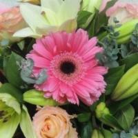 Mom I Love You Boquet  · designers  choice of in season flowers . Mixed colors pinks whites and reds