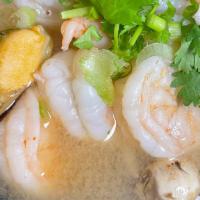 Tom Yum Mixed Seafood  · Spicy and sour clear lemongrass broth with mixed seafood  (Shrimp, Scallop, Mussel, Squid, F...