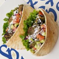 Ground Beef Kabob Pita · Ground beef kabob with lettuce, tomatoes, cucumber, onions, and your choice of sauce wrapped...