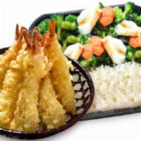 Shrimp Tempura(7) Plate · Shrimp tempura (7 pieces) with steamed rice and vegetables (cabbage, broccoli, and carrot).