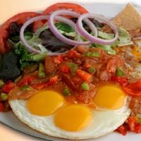 Huevos Rancheros · Eggs. Topped with salsa.