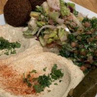Vegetarian Combo · Hummus, tabbouli, vegetarian grape leaves, falafel and baba ghannouj.