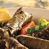 Meat Grape Leaves · A mix of rice, meat and spices wrapped in grape leaves.
