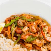 Ghallaba Chicken · Chicken sautéed with fresh vegetables, carrots, bell peppers, tomatoes, onions, mushrooms an...