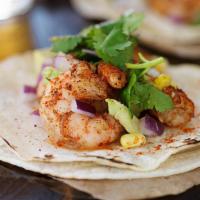 Grilled Shrimp Taco · Freshly grilled shrimp with melted cheese topped with pico de gallo and sauce.