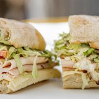 Turkey Sandwich · Natural roasted turkey breast, havarti, iceberg, tomato, herb aioli, balsamic.