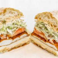 Chicken Milanese · Breaded chicken, lettuce, tomato, swiss and aioli.