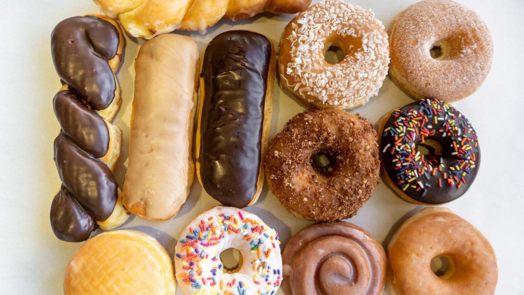 Yum Yum Dozen Mix (14Pcs) · Fourteen of our most popular Donuts, Twists, Bars and Filled.
