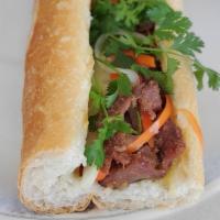 Pork Grill Sandwich Baguette Vietnamese Style · 10inch French style Baguette, Handmade Butter Spread, Pork Grill Vietnamese ingredients sauc...