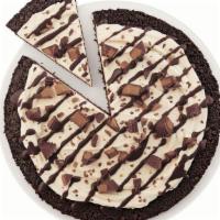 Reese’S® Peanut Butter Cups Dq Treatzza Pizza® · Our fudge cookie crunch crust covered with our world famous vanilla soft serve, mixed with p...