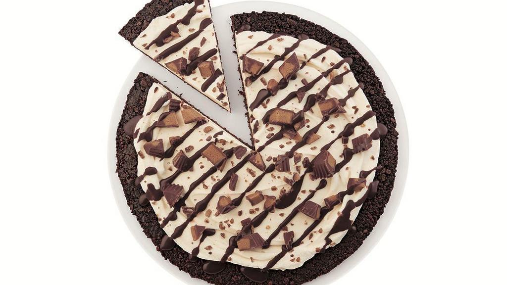 Reese’S® Peanut Butter Cups Dq Treatzza Pizza® · Our fudge cookie crunch crust covered with our world famous vanilla soft serve, mixed with peanut butter topping and topped with REESE’S® peanut butter cup pieces and a chocolatey drizzle.