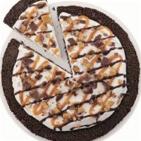 Heath® Dq Treatzza Pizza® · Our fudge cookie crunch crust covered with our world famous vanilla soft serve and topped wi...