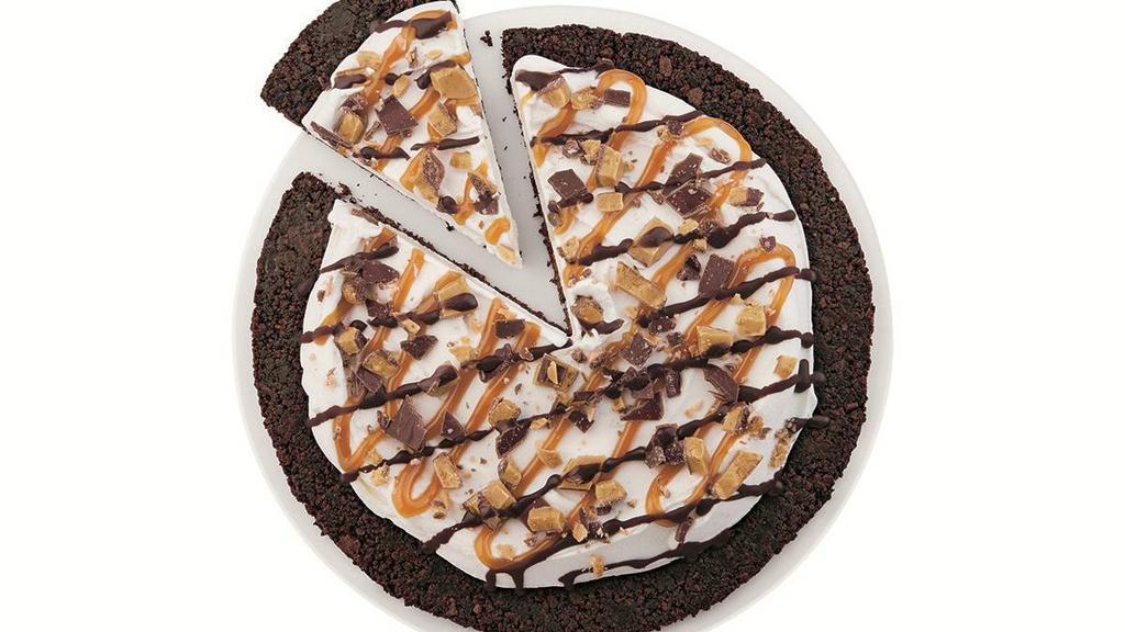 Heath® Dq Treatzza Pizza® · Our fudge cookie crunch crust covered with our world famous vanilla soft serve and topped with HEATH® candy pieces, caramel topping, and a chocolatey drizzle.