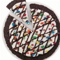 M&M’S® Dq Treatzza Pizza®  · Our fudge cookie crunch crust covered with our world famous vanilla soft serve and topped wi...