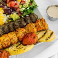 Chicken Soltani (Combo) Plate · combination of 1 skewer boneless chicken + 1 skewer beef koobideh. served with basmati rice,...