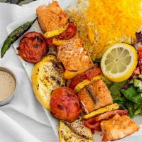 Grilled Salmon Plate · Charbroiled center cut fresh salmon. served with basmati rice, House salad, and grilled toma...