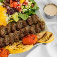 Beef Kebab Koobideh Plate · 2 skewers of charbroiled seasoned ground beef. served with basmati rice, House salad, and gr...