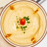 Hummus Garbanzo · Bean dip with pita bread.