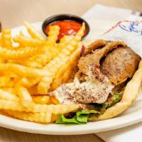 Gyros Sandwich · Sandwich cuts of seasoned meat with tomatoes, onions, lettuce, wrapped in pita bread, topped...