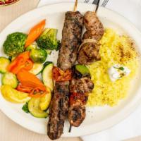 Shish Kabob Platter · Char-broiled skewer of lamb, beef, or chicken with rice and Greek salad.
