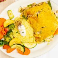 Chicken Delight · Boneless chicken over vegetables topped with a cream of mushroom
curry sauce served with ric...