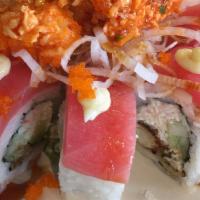 Red Ferrari Roll* · Crabmeat, cucumber roll topped with fresh tuna sand succulent spicy scallops in the center o...