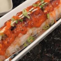 Las Vegas *Roll · Spicy crab, cream cheese inside topped with baked salmon, masago green onions, sesame seeds,...