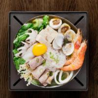 Seafood And Tofu Hot Soup · The freshness and sweetness of the seafood with pork infuse into the broth, creating an irre...