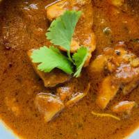 Chicken Curry · Traditional tender chicken cutlets cooked in Indian spices.