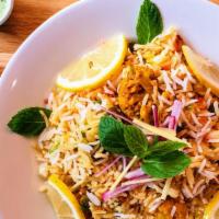 Veg Biryani · Sweet and savory veggies slow-cooked in basmati rice.