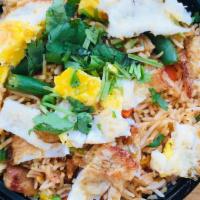 Chicken Fried Rice · Cooked rice that has been stir-fried  and mixed with eggs, vegetables, chicken breast pieces...