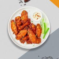 Classic Vegan Wings · Fresh vegan wings breaded and fried until golden brown. Served with a side of vegan ranch or...