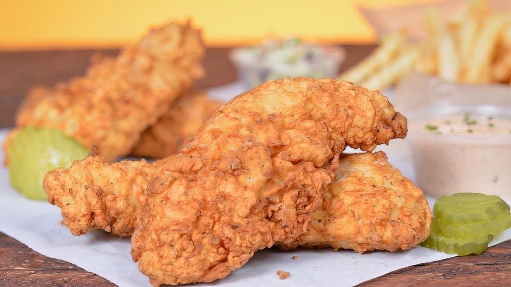4 Tendies Tenders · 4 pieces of Tendies’ famous jumbo, buttermilk herb marinated, double hand-breaded chicken tenders with tangy coleslaw, pickles and choice of sauces or seasoning.