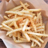 Tendies Seasoned Fries · Crispy crinkle cut fries tossed with Tendies’ Cajun garlic seasoning and served with homemad...