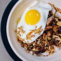 Ribeye Bistek Bowl · Usda choice ribeye, fried shallots, fried egg, ponzu, and rice.