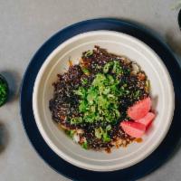 Shredded Pork Bowl · Braised pork, roasted sesame seed, scallions, seaweed, pickled red radish, and rice.