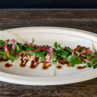 Pork Belly Jicama Tacos · Spicy. Seared pork belly, jicama taco shell, sriracha, cilantro, and pickled red onions.