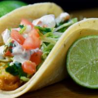 Famous Fish Taco · Battered Cod, cabbage, dressing, pico de gio.