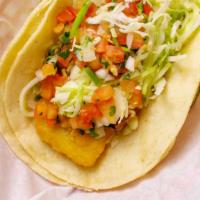 (1) Fish Taco Combo Plate · One fish taco and include a side of Rice & Beans