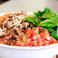 Burrito Bowl · Your choice of protein, rice, beans, caramelized onions, pico de gallo and jack cheese.