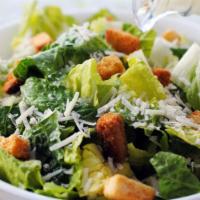 Caesar Salad · Romaine Lettuce, Parmesan Cheese, Garlic Croutons, Signature Caesar Dressing
